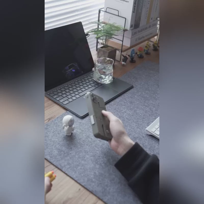 G-OUSSVE Folding soft bullet gun for iPhone that can fire spray shells and simulate a pistol toy for children and boys